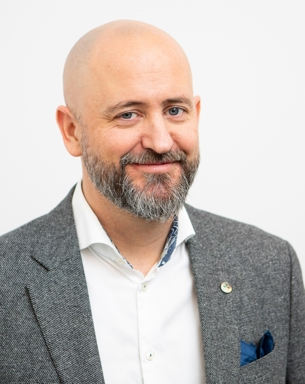 Porträttfoto på Nils Fall