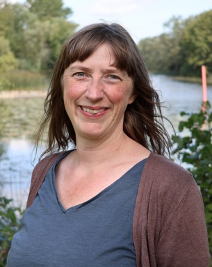 A person in front of water